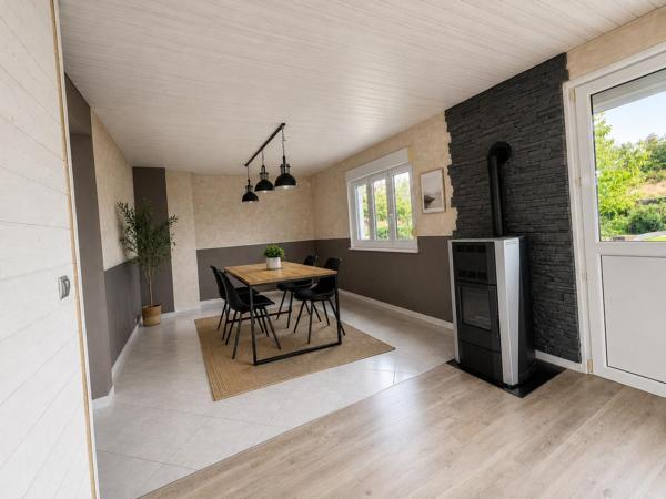 MAISON AVEC 14 PANNEAUX PHOTOVOLTAÏQUES ET POMPE A CHALEUR