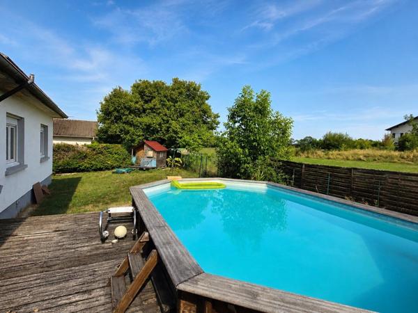 MAISON AVEC 14 PANNEAUX PHOTOVOLTAÏQUES ET POMPE A CHALEUR
