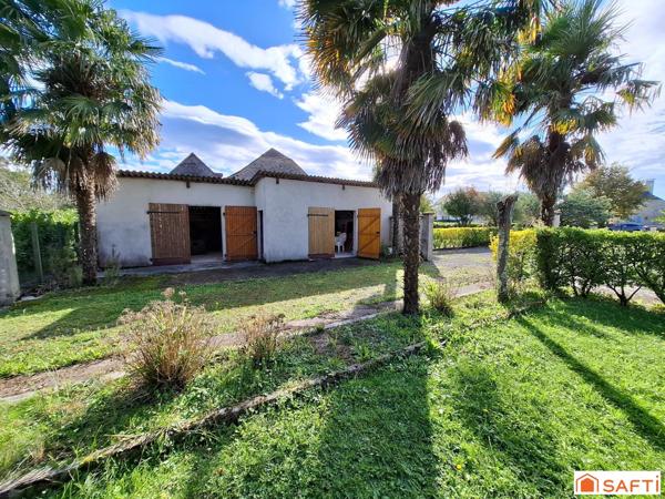 Maison familiale sur vaste terrain avec dépendances et fort potentiel