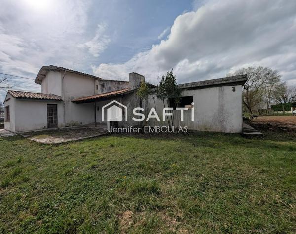 Maison 140 m² - Deux garages attenants - Jardin