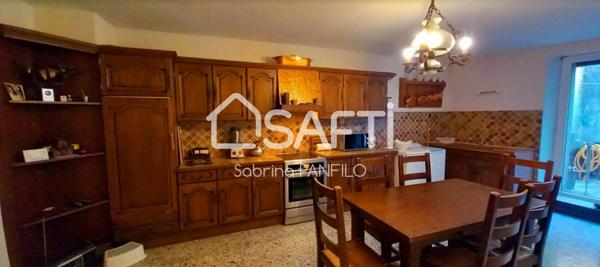 MAISON DE VILLE AVEC GARAGE ET TERRAIN