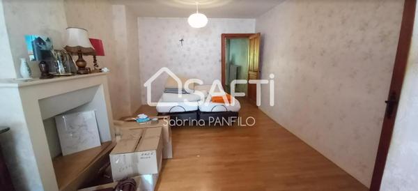 MAISON DE VILLE AVEC GARAGE ET TERRAIN