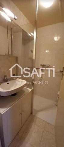 MAISON DE VILLE AVEC GARAGE ET TERRAIN