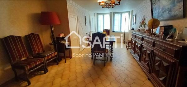 MAISON DE VILLE AVEC GARAGE ET TERRAIN