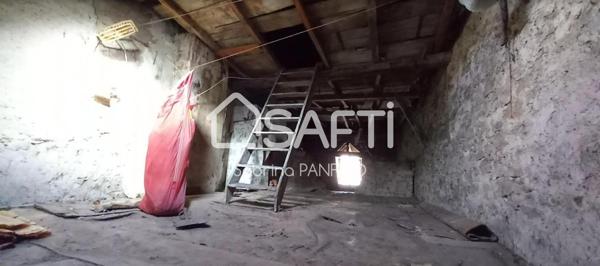 MAISON DE VILLE AVEC GARAGE ET TERRAIN