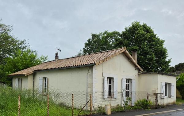 Maison proche centre avec jardin