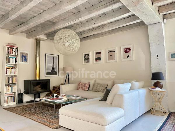PRÉVESSIN-MOËNS – Ancienne forge du XIXᵉ transformée en loft – 187 m² – 3 chambres – Jardin