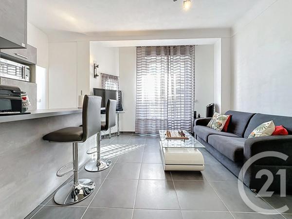 Appartement F3 à vendre  3 pièces - 62 m 2   JUAN LES PINS  - 06