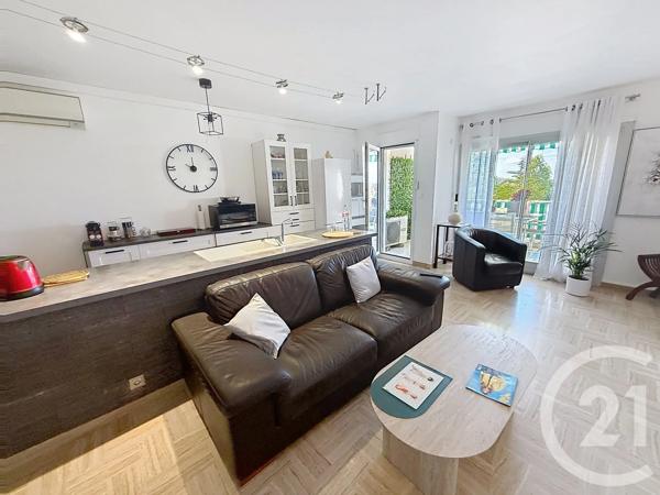 Appartement F3 à vendre  3 pièces - 62 m 2   JUAN LES PINS  - 06