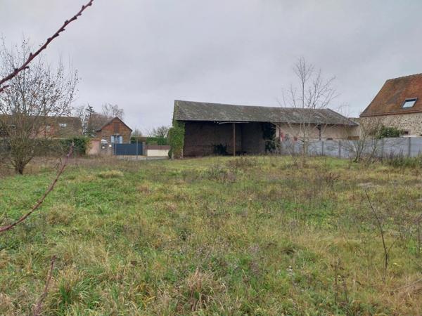 Terrain et grange