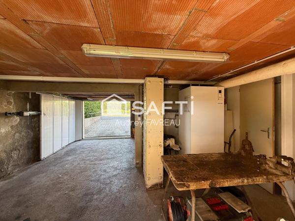 Maison sur sous-sol, 2 chambres, bureau, 2 garages