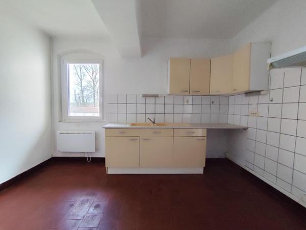 Immeuble de rapport 4 appartements et une maison