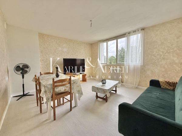 Appartement 3 chambres, cave et place de parking