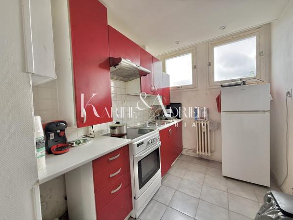 Appartement 3 chambres, cave et place de parking