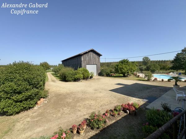 Maison en pierres 230 m² - 4 chambres - Terrain 7 370 m² - Piscine - Dépendances