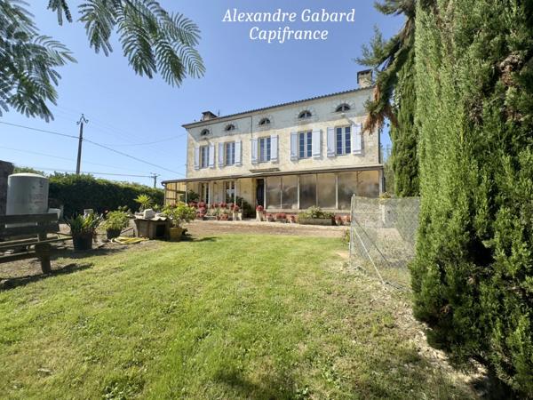 Maison en pierres 230 m² - 4 chambres - Terrain 7 370 m² - Piscine - Dépendances