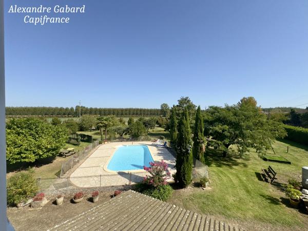 Maison en pierres 230 m² - 4 chambres - Terrain 7 370 m² - Piscine - Dépendances