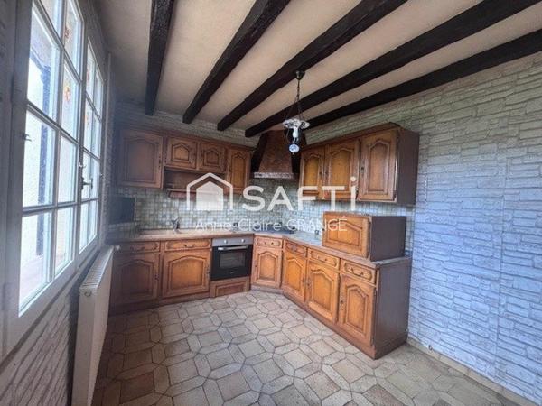 Potentiel pour cette charmante maison de plein-pied