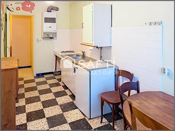 T3 centre-ville avec balcon, garage et stationnement