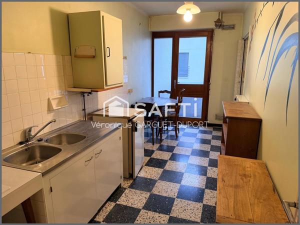 T3 centre-ville avec balcon, garage et stationnement