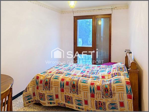 T3 centre-ville avec balcon, garage et stationnement