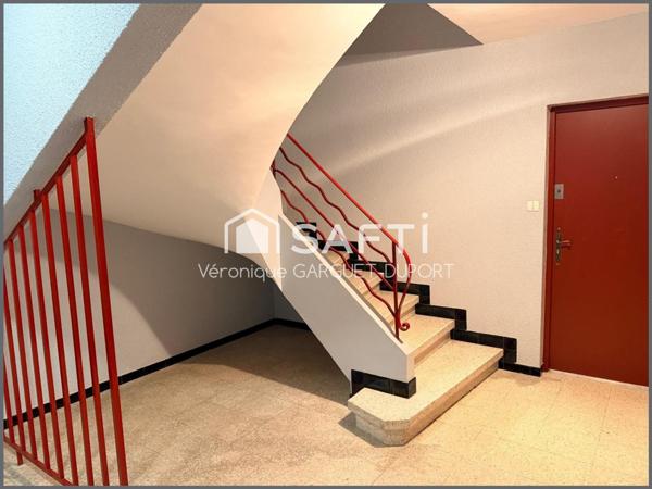 T3 centre-ville avec balcon, garage et stationnement