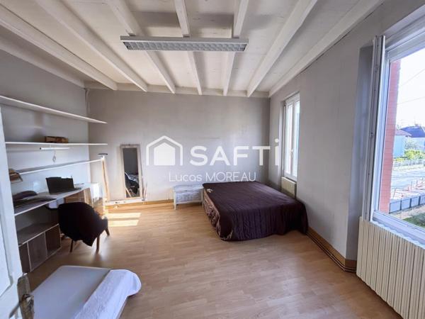 Immeuble de rapport de 2 locaux et un plateau R+1