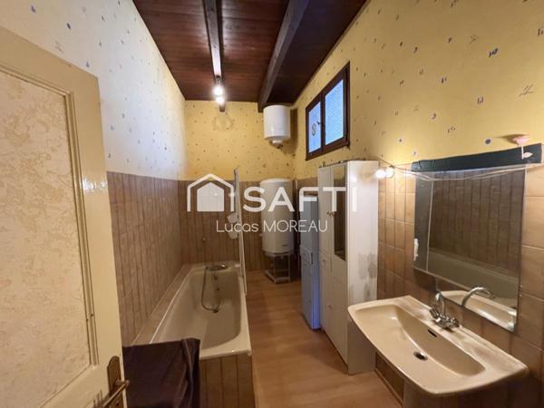 Immeuble de rapport de 2 locaux et un plateau R+1