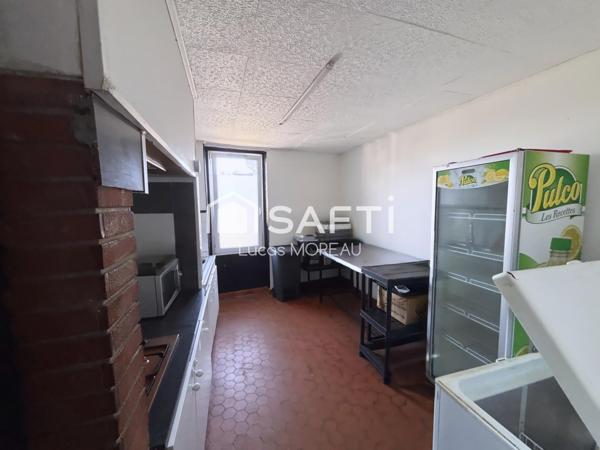 Immeuble de rapport de 2 locaux et un plateau R+1