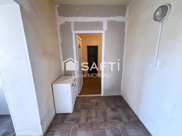 Immeuble de rapport de 2 locaux et un plateau R+1