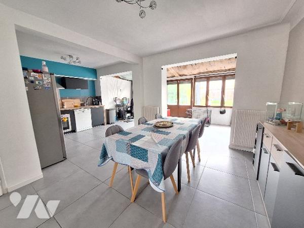 Maison 4 chambres, jardin, garage.