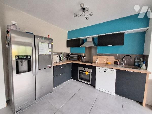 Maison 4 chambres, jardin, garage.