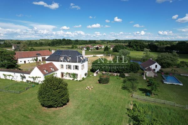 Belle propriété aux portes de Moulins avec nombreuses dépendances sur 12ha de terrain libre