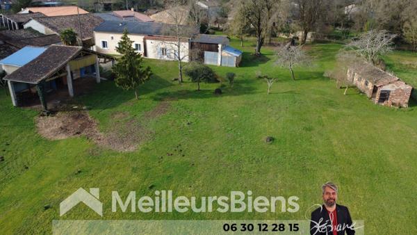 Maison et dépendances dont écurie et terrain