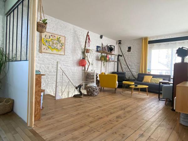 Appartement T4 avec terrasse extérieure et espace complémentaire privatif