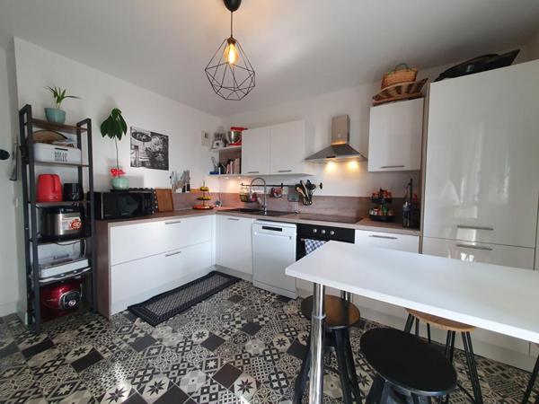 Appartement 4 pièces 87m² avec place de parking sécurisé