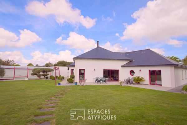 Plain pied et sa piscine couverte