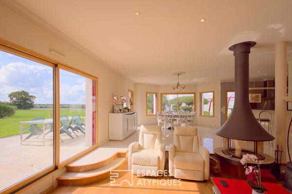 Plain pied et sa piscine couverte