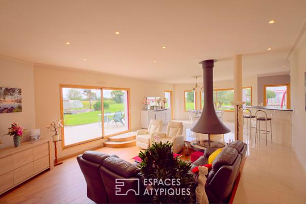 Plain pied et sa piscine couverte