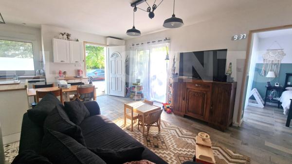 À VENDRE - Appartement T3 de 64 m² en rez-de-chaussée avec terrasse, stationnement, parc arboré et p