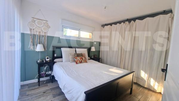 À VENDRE - Appartement T3 de 64 m² en rez-de-chaussée avec terrasse, stationnement, parc arboré et p