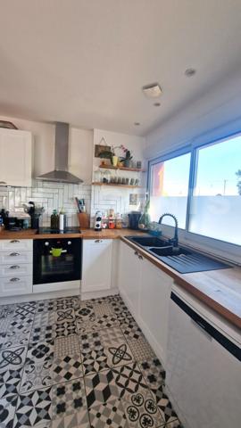 À VENDRE - Appartement T3 de 64 m² en rez-de-chaussée avec terrasse, stationnement, parc arboré et p