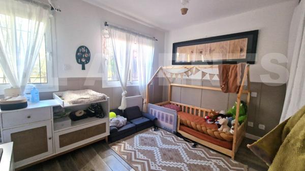 À VENDRE - Appartement T3 de 64 m² en rez-de-chaussée avec terrasse, stationnement, parc arboré et p