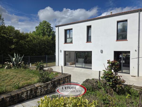EXCLUSIVITE BOUGUENAIS BOURG : RT 2012 de qualité, 106 m² + terrasse et garage, au calme !
