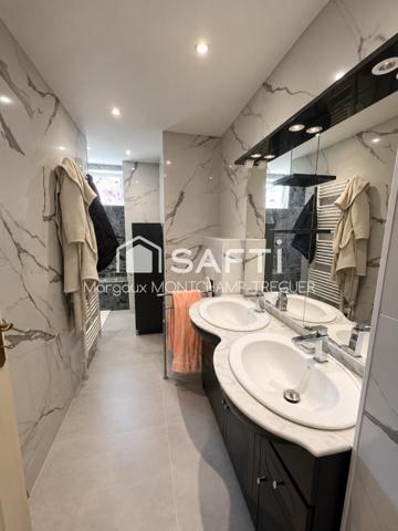 Rez-de-jardin de 85m², grand jardin, garage double