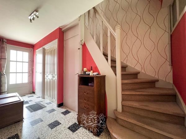 Charmante maison à rénover avec garage jardin dégagé