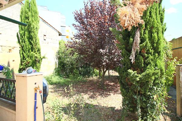 Chambre dans une maison de 2 chambres avec Terrasse et Jardin