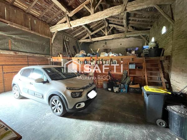 Maison 7 pièces avec garage et grange