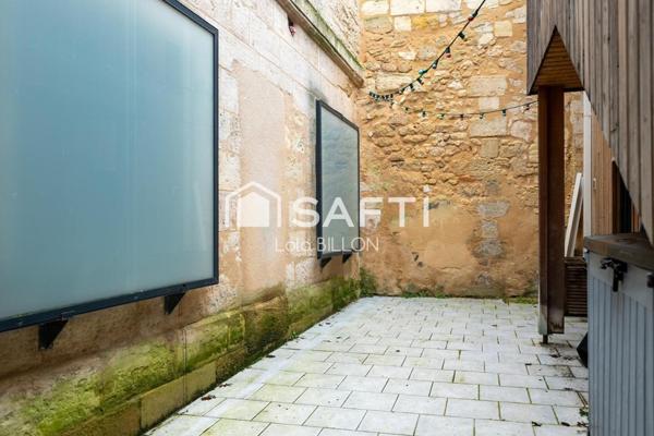 Maison de 124,5 m² avec patio et stationnement