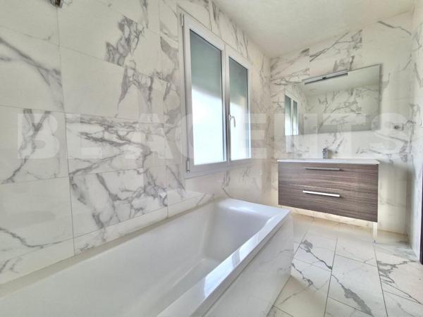 Maison familiale contemporaine classée A avec jardin, carport et sous-sol – À 7 min à pied de la gar